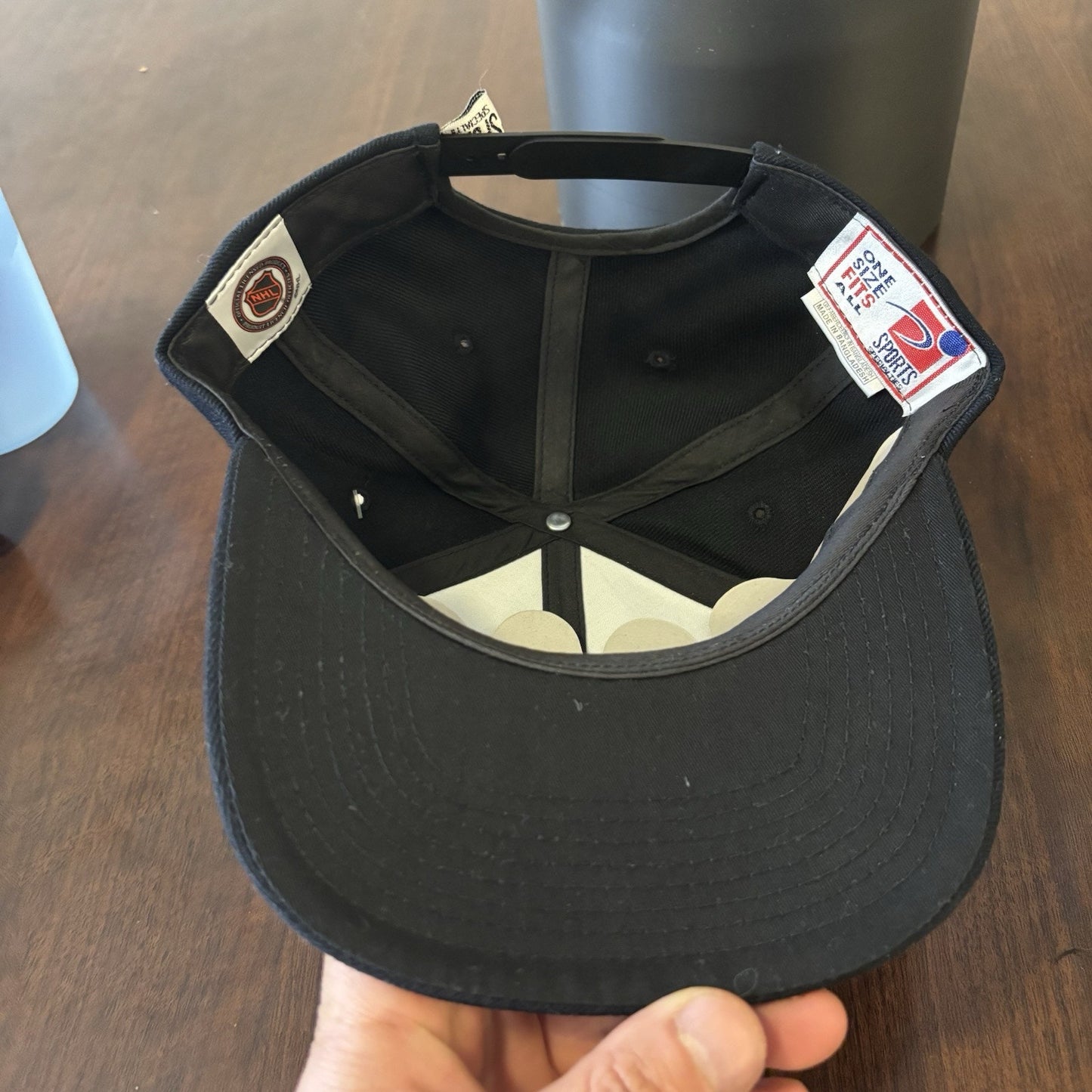 Black NHL Sports Specialties Hat